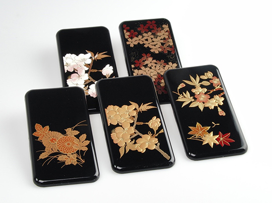 "Urushi Black" tone bioplastic samples with makie-style printing
