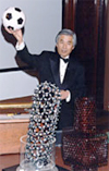 Photo of Sumio Iijima with Carbon Nanotume model